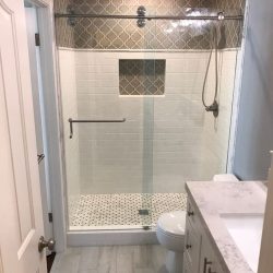 New bathroom renovation, new shower, countertops, vanities, wood laminate flooring